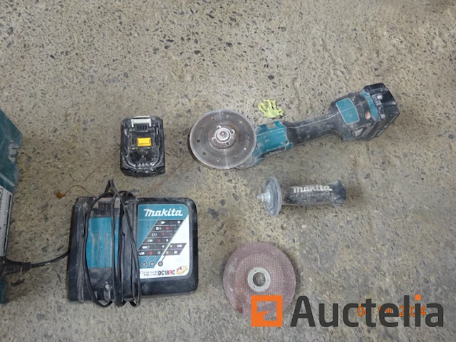 1 haakse slijper makita, in de originele doos met oplader en batterij - afbeelding 2 van  2