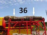 1 set van +/- 20 boomstammen +/- 2m20 lang/diam. 40cm + de 4 stuks op de machine - afbeelding 3 van  6