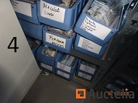 1 set van 3 metaal rekken waarvan een belangrijk voorraad reserve stukken voor storm horloge, 2 rekken ikea stijl houten op wielen remolies van storm stukken - afbeelding 8 van  11