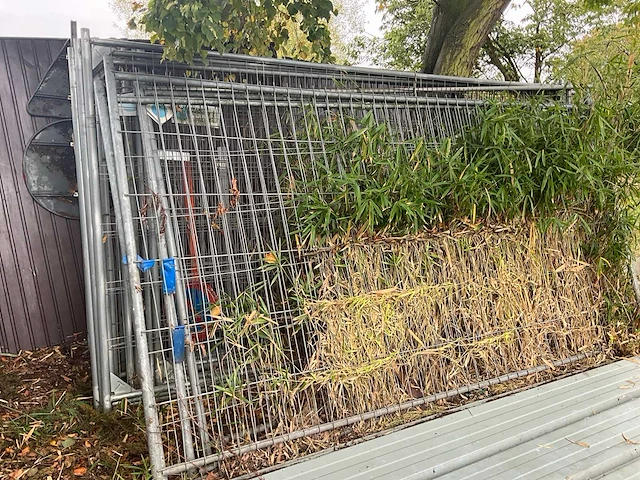 15x heras-hekken met betonblokken - afbeelding 1 van  3