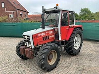 1985 steyr 8080a turbo vierwielaangedreven landbouwtractor - afbeelding 1 van  29