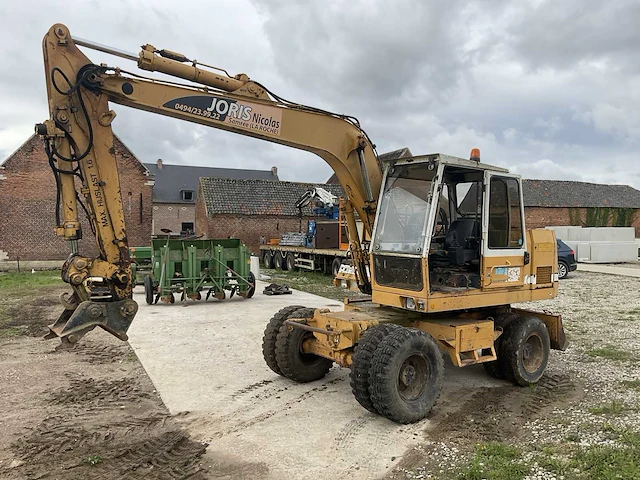 1987 liebherr a9003 banden graafmachine - afbeelding 1 van  20
