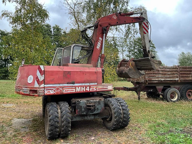 1989 o&k mh4 banden graafmachine - afbeelding 1 van  24