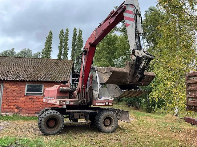 1989 o&k mh4 banden graafmachine - afbeelding 19 van  24