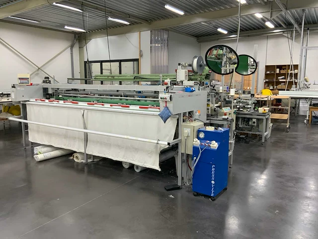1994 rotox ia 390 automatische stoffen snij- en afboordmachine - afbeelding 1 van  17
