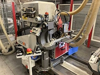 1999 koch compact n.c. dubbelzijdige zaag-,boor- en drevel-invoegmachine - afbeelding 24 van  27