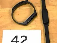 2 diverse fitbits, werking niet gekend, zonder kabels