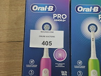 2 elektrische tandenborstels braun oral b pro junior 6+ purple and green (b435) - afbeelding 2 van  6