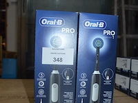 2 elektrische tandenborstels braun oral b pro series 1 black (b435) - afbeelding 1 van  3