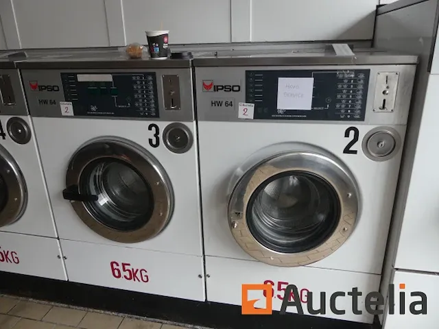 2 professionele wasmachines 6,5 kg met ipso hw64 token coin - afbeelding 1 van  7