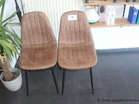 2 stoelen in skai bekleed