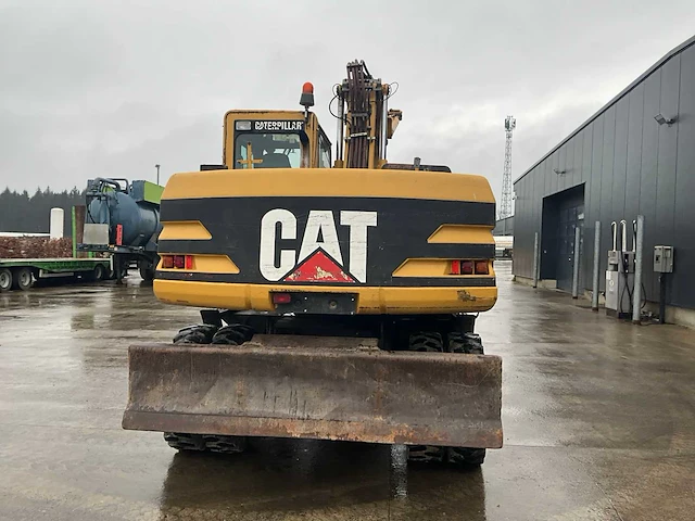 2002 caterpillar m315 banden graafmachine - afbeelding 23 van  28