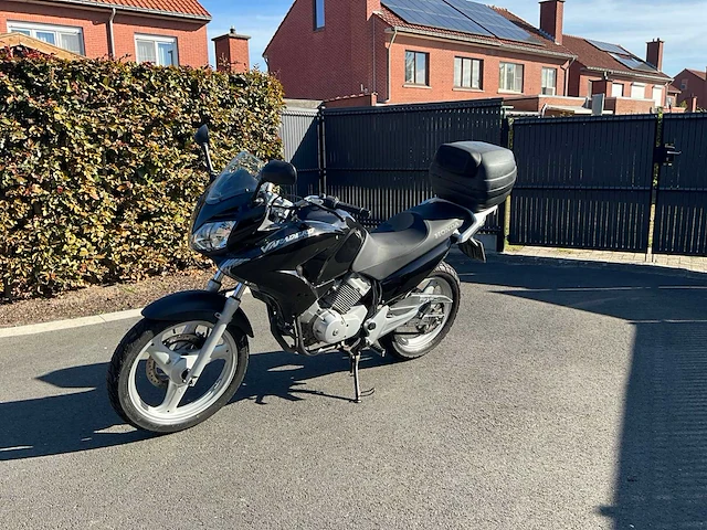 2009 honda xl 125v motorfiets - afbeelding 1 van  35