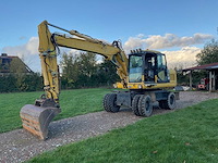 2011 komatsu pw160-7eo banden graafmachine - afbeelding 1 van  34