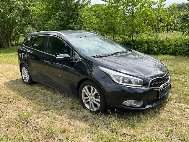 2012 kia new rio personenauto - afbeelding 30 van  32
