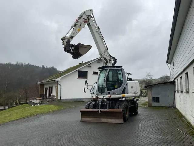 2012 new holland we150 banden graafmachine - afbeelding 8 van  46