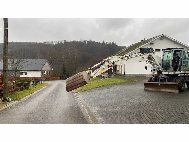 2012 new holland we150 banden graafmachine - afbeelding 9 van  46