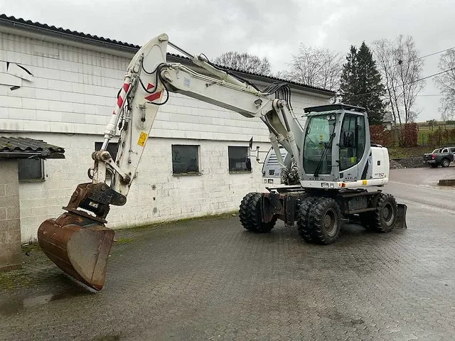 2012 new holland we150 banden graafmachine - afbeelding 1 van  46