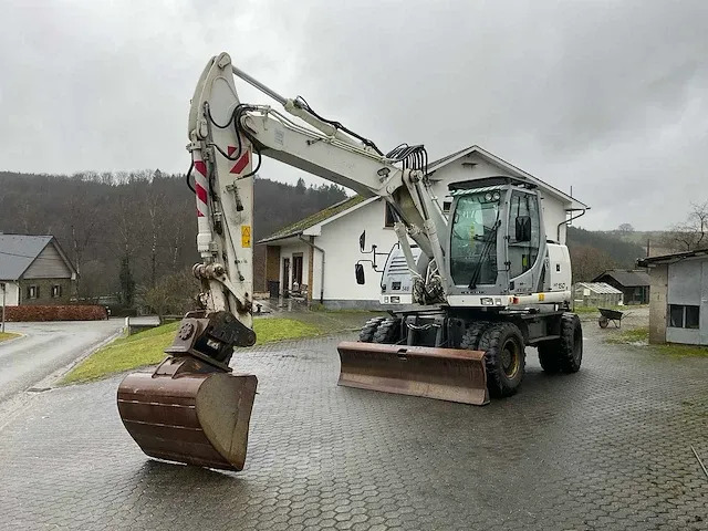 2012 new holland we150 banden graafmachine - afbeelding 12 van  46