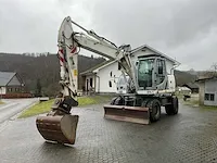 2012 new holland we150 banden graafmachine - afbeelding 12 van  46