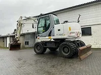 2012 new holland we150 banden graafmachine - afbeelding 43 van  46