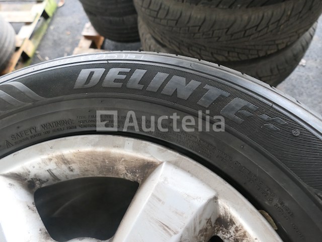 4 tweedehands banden op delinte velg (afmetingen: 245/65r17 107h) - afbeelding 4 van  6