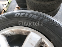 4 tweedehands banden op delinte velg (afmetingen: 245/65r17 107h) - afbeelding 4 van  6