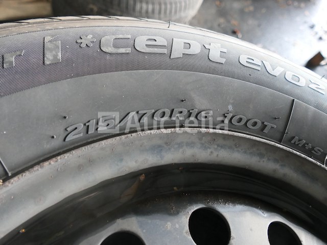 4 tweedehands winterbanden op hankook stalen velg (afmetingen: 215/70 r16 100t) - afbeelding 6 van  6