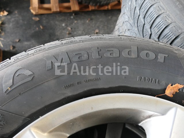 4 tweedehands winterbanden op natador spidirsnow aluminium velg (afmetingen: 215/70r16 100t) - afbeelding 1 van  6