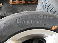 4 tweedehands winterbanden op natador spidirsnow aluminium velg (afmetingen: 215/70r16 100t) - afbeelding 1 van  6
