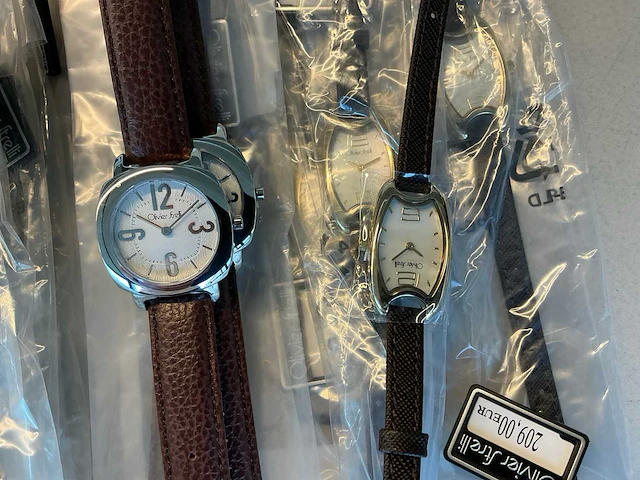 50 diverse horloges rodania en olivier strelli - afbeelding 13 van  15