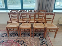 8 houten stoelen met rieten zit