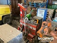 Banden de-en montageapparaat
