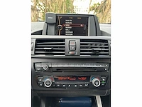 Bmw - 2014 - 116i - personenauto - afbeelding 22 van  34