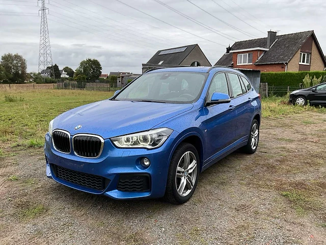 Bmw - 2017 - x1 - sdrive 18i - personenauto - afbeelding 1 van  60