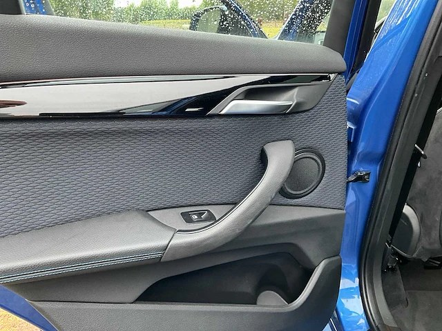 Bmw - 2017 - x1 - sdrive 18i - personenauto - afbeelding 43 van  60
