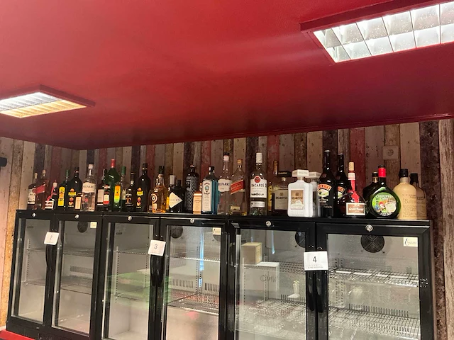 Ca 50 flessen diverse geestrijke drank - afbeelding 1 van  14