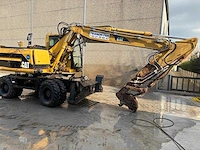 Caterpillar - 2000 - m315 - banden graafmachine - afbeelding 1 van  10