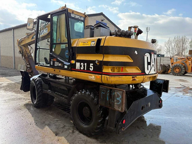 Caterpillar - 2000 - m315 - banden graafmachine - afbeelding 3 van  10