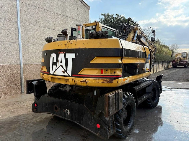 Caterpillar - 2000 - m315 - banden graafmachine - afbeelding 4 van  10