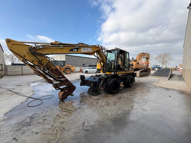 Caterpillar - 2000 - m315 - banden graafmachine - afbeelding 5 van  10