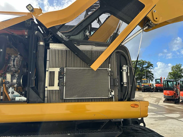 Caterpillar- 2019 - m314f - bandengraafmachine - afbeelding 21 van  65