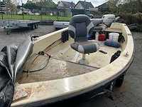 Complete vissersboot met honda buitenboordmotor + trailer (vaarklaar) - afbeelding 10 van  28