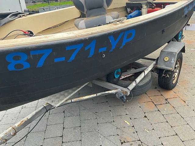 Complete vissersboot met honda buitenboordmotor + trailer (vaarklaar) - afbeelding 19 van  28