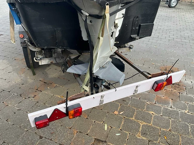 Complete vissersboot met honda buitenboordmotor + trailer (vaarklaar) - afbeelding 24 van  28