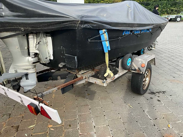 Complete vissersboot met honda buitenboordmotor + trailer (vaarklaar) - afbeelding 25 van  28