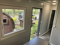 Container-cabine-mobiele woonunit-zorgunit-kantoorunit 33,6m2 - 12mx2,8m - afbeelding 25 van  65