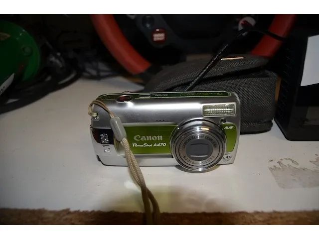 Digitaal fototoestel canon, tablet, co2 meter ayewau, racing stuur met pedalen thrustmaster - afbeelding 6 van  10