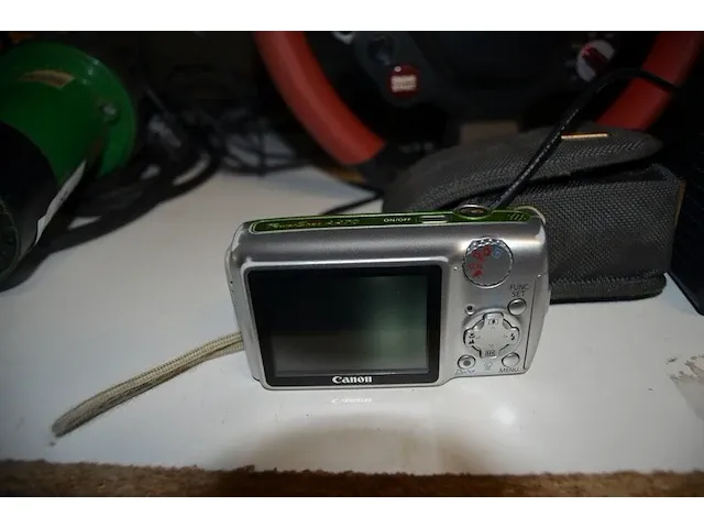 Digitaal fototoestel canon, tablet, co2 meter ayewau, racing stuur met pedalen thrustmaster - afbeelding 7 van  10