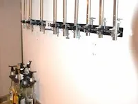 Drankendispenser, bevestigd aan de muur - afbeelding 1 van  2